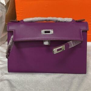 Elegant Purple Top-Handle Leather Bag Pochette in swift leather